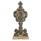 Reliquary in silver, eighteenth century on a wooden base. Dated on the base 1793. Initial F.M. H 37