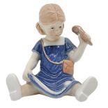 Copenhagen porcelain figurine depicting a child with doll with ice cream cone. H 15 cm