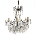 SIx lights chandelier, metal frame and pendalogues. H 55 cm x50