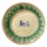 Plate Caltagirone, green sponge with blue edges and ducks at the center. XX century. Diameter 35 cm