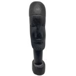 Wooden sculpture depicting African man. H 31 cm, 9 cm base