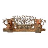 Fragment of handcart, molten wing. In polychrome wood carved cherubs, gargoyles and wrought iron at