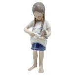 Copenhagen porcelain figurines depicting child with kitten. H 17.5 cm