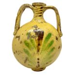 Flask biansata in majolica pottery from Caltagirone, Sicily, sexolo late nineteenth. In shades of ye
