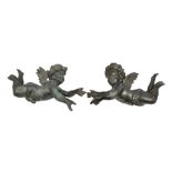 Pair of bronze angels, nineteenth century. Length 36 cm