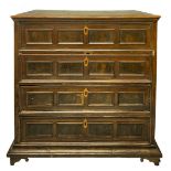 Chest of drawers in walnut, late seventeenth century, Emilia. On the four drawers decorated each wit