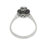 Ring in white gold with diamond in the center and of Diamonds. Gr 3.3