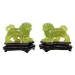 Pair of Pho dogs in green jade. H overall 10 cm, width 10 cm