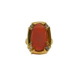 Red gold ring with coral and Diamonds at the four corners. 55 Gr 7.8 M.