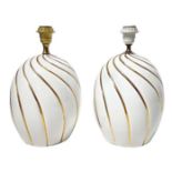 Pair of Abat jours in white porcelain, Italian prod. Surface showing details in gold. 70's. H 39 cm