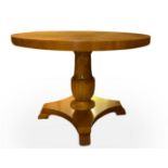 Biedermeier round table extendable, XX century. Four-spokes base and lion foot. H 65 cm, diameter 90