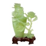 Perfume burner in jade with floral decorations, China. H 19 cm with base.