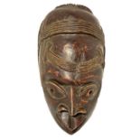 Mask Bamileke, Cameroon, mid-twentieth century. H 35 cm