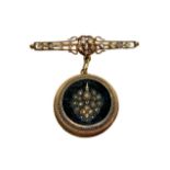 Brooch antique gold pendant with roses and on the bottom in black enamel. pendant diameter 2.7 cm. S