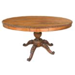 Chiara walnut oval center table, four-spoke foot. End nineteenth century, drawer on the floor both s