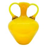 Solifiore vase at white balustrade in yellow shades. 23x19 cm