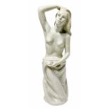 Le Bertetti, white paste sculpture Craquele effect depicting wetting woman with drape. 1950s, signed