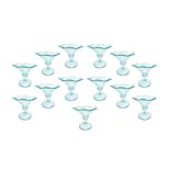 N. 18 turquoise-colored glass cups. H 12 cm. H 12 cm