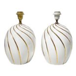 Pair of white porcelain lamps, prod Italian. Surface Showing Details in gold. 70's. , H cm 39. Diame