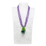 Necklace with two wires of faceted amethyst with pendant in crisoprasio. Silver lock. Length 72 cm