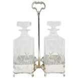 Pair of bottles with silver support. Gr.370 H cm 34. L. 22 cm. Base 22x10 cm.
