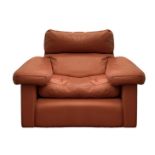 Frau armchair, armchair, Tito Agnoli design. 90s, wooden structure, leather cladding first cognac co