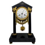 Table pendulum clock, Empire, first nineteenth century. In Belgian black marble, with wired pendulum