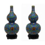 Pair of Chinese vases with base. H 23 cm