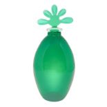 Venini, small bottle in Murano glass green color with cap that recalls forms of nature. Signed on Ve