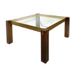 Low skipper design coffee table Renato polydy, wooden feet and glass on the floor. 78x78 cm