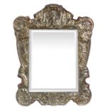 Frame with mirror . 20th century, in 925 punched silver in Baroque style H cm 50x40