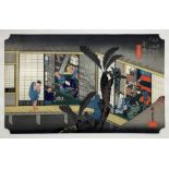 Nishiki-and polychrome polyographic engraving in frame. depicting attendants in an inn in the city o