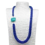 Intertwined necklace. of Lapis Lazuli with an internal steel structure, with a green laRimar central