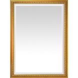 Mirror in golden lacquered wood frame