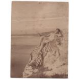 Von Gloeden, Wilhelm (Wismar 1856-Taormina 1931) - Boy lying on the rocks with a view of Giardin