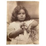 Von Gloeden, Wilhelm (Wismar 1856-Taormina 1931) - Little girl with flower in her hand.