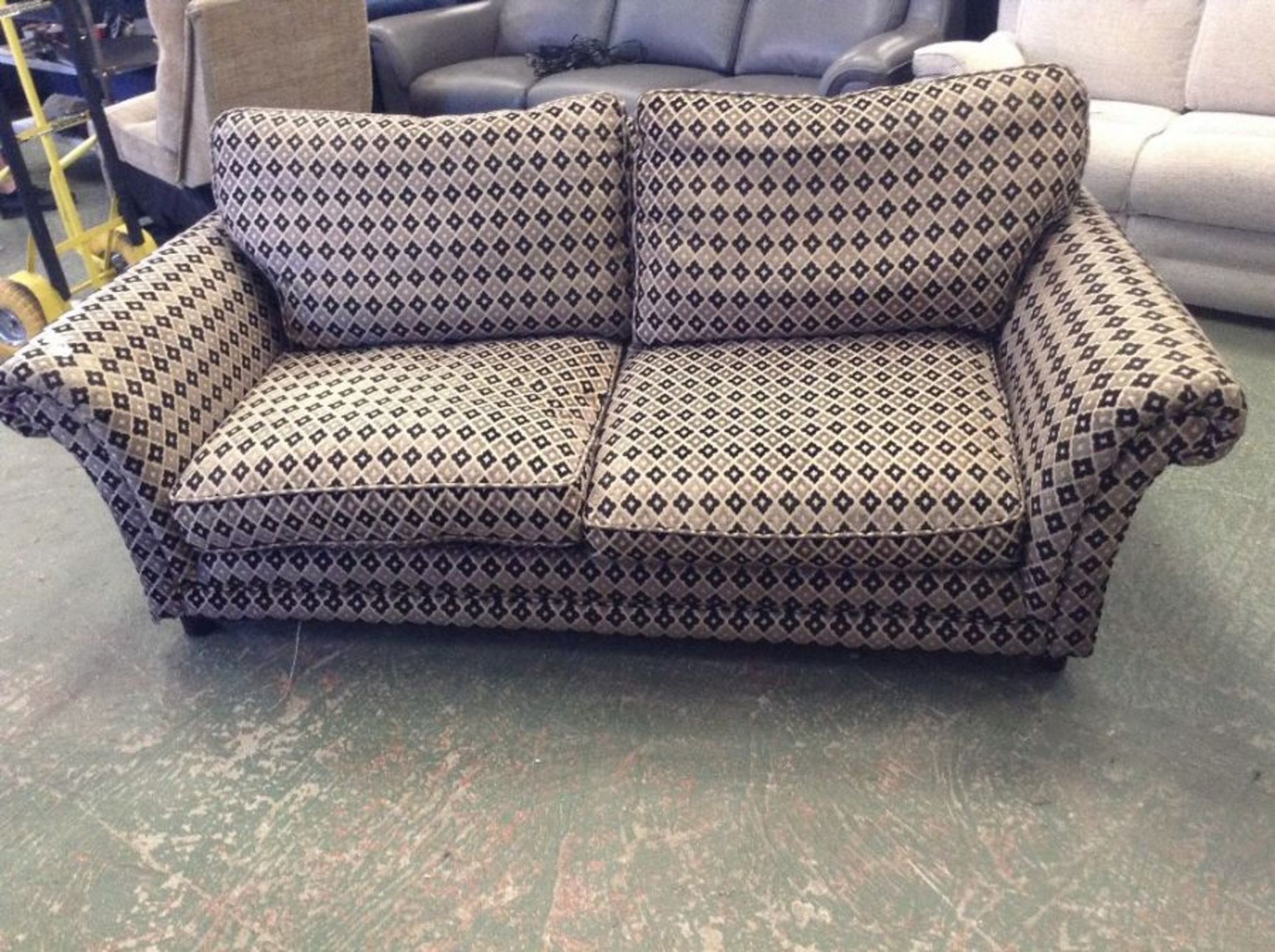 BLACK PATTERNED 3 SEATER SOFA (DAMAGED MARKED MISS