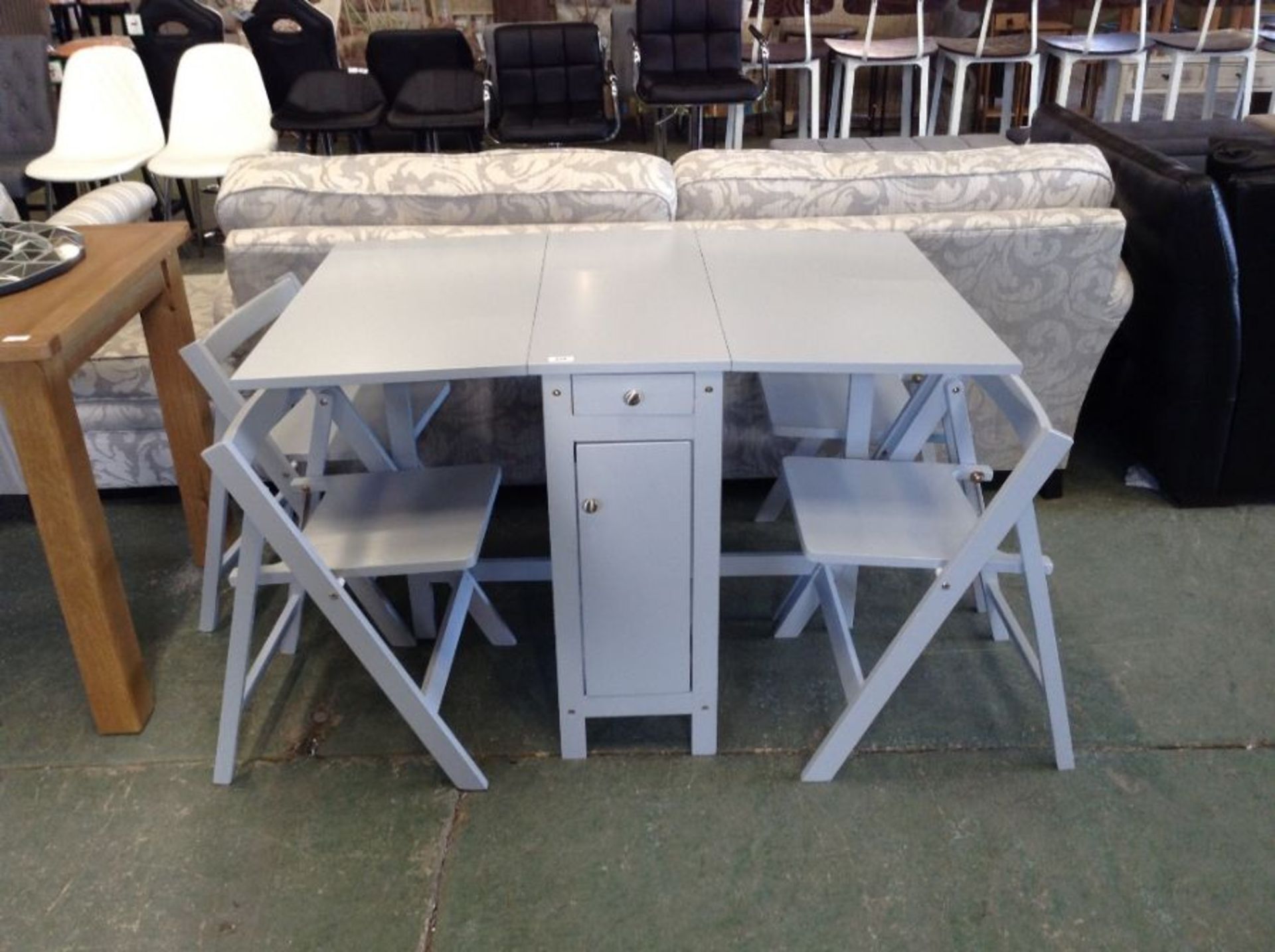 GREY DROP LEAF TABLE AND 4 CHAIRS (DAMAGED CORNER)