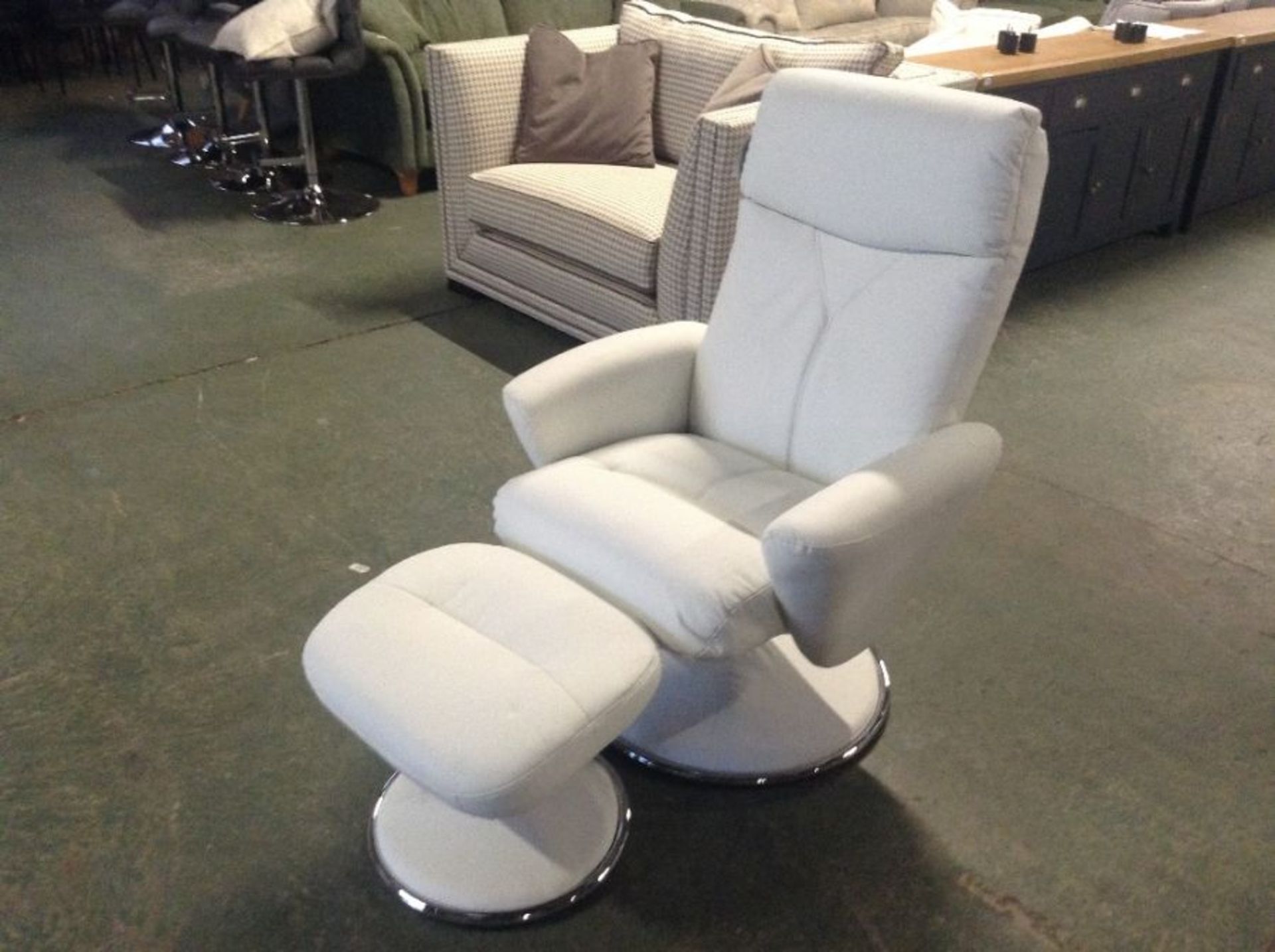 WHITE FAUX LEATHER SWIVELLING RECLINING CHAIR AND