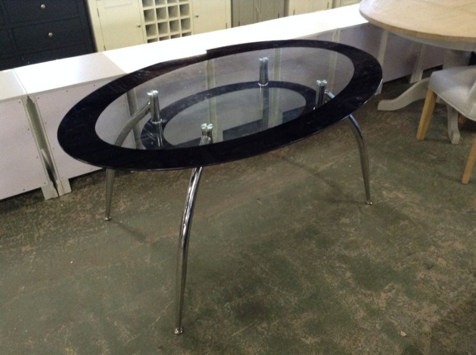GLASS OVAL TABLE