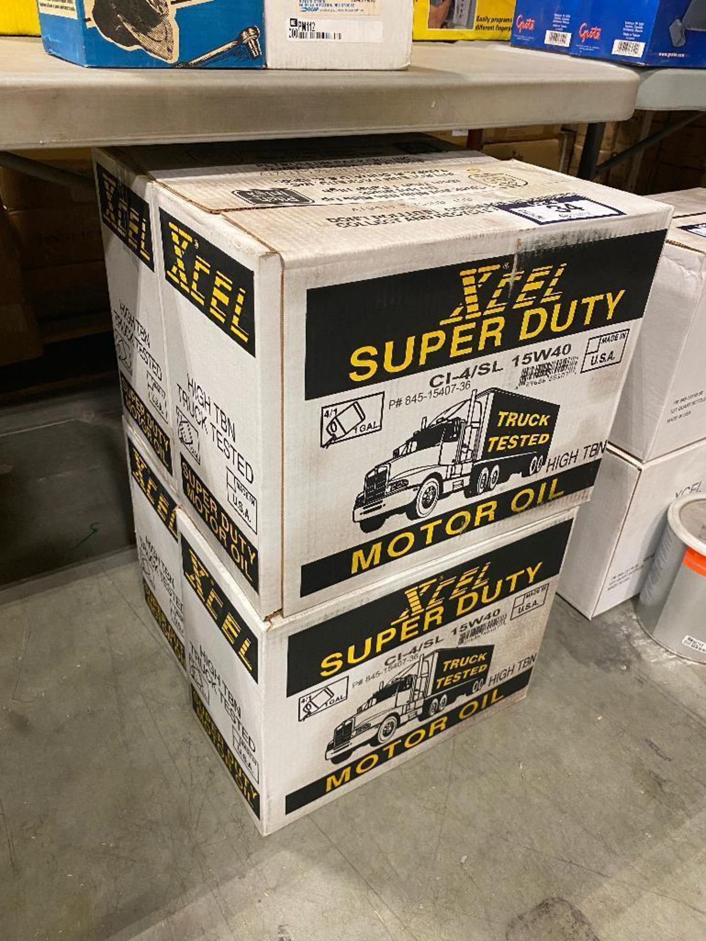 Lot of (4) Cases of Xcel Super Duty 15W40 Motor Oil