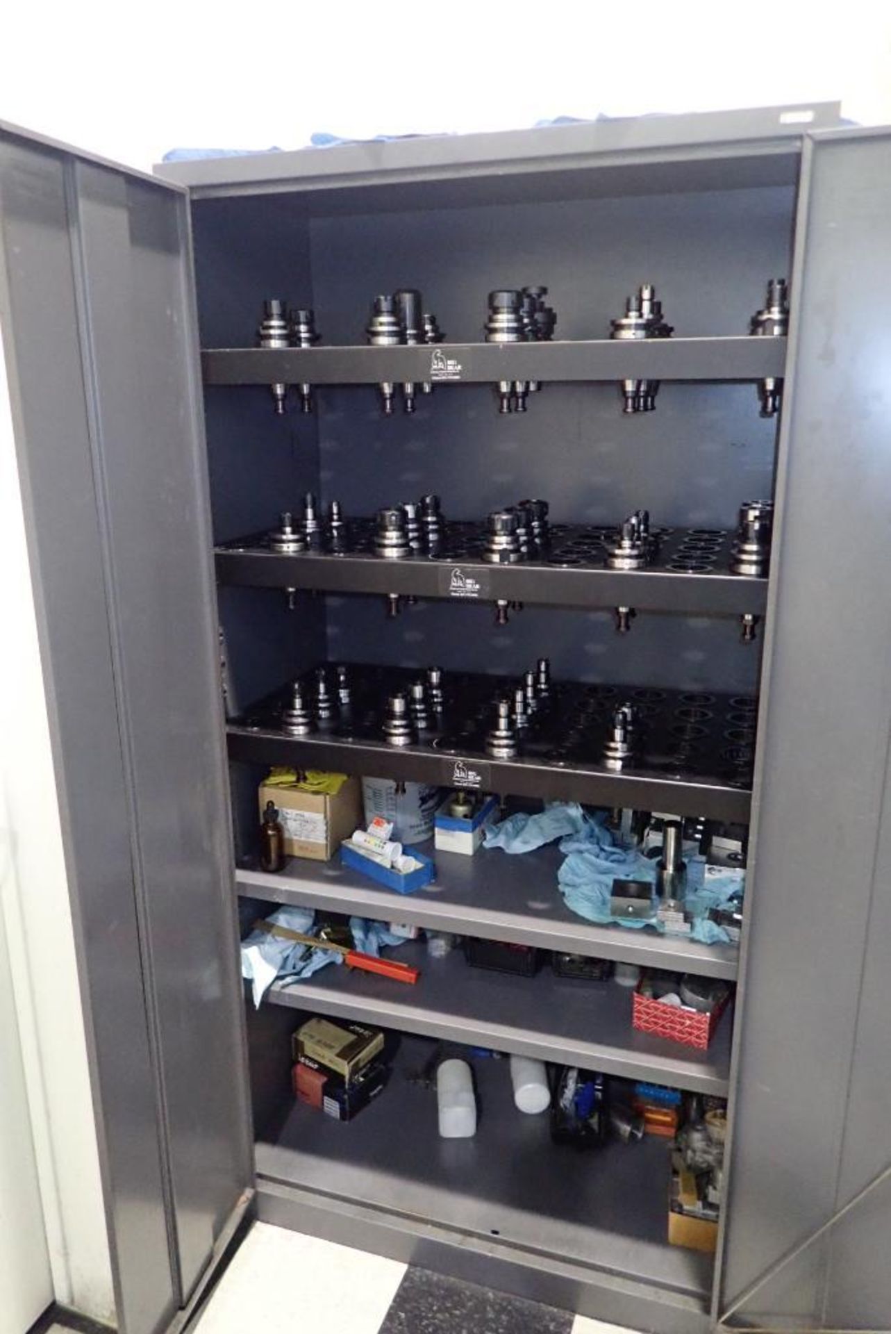 Lot of 2-Door Metal Storage Cabinet w/ 41 Asst. BBT40 Tool Holders, etc.