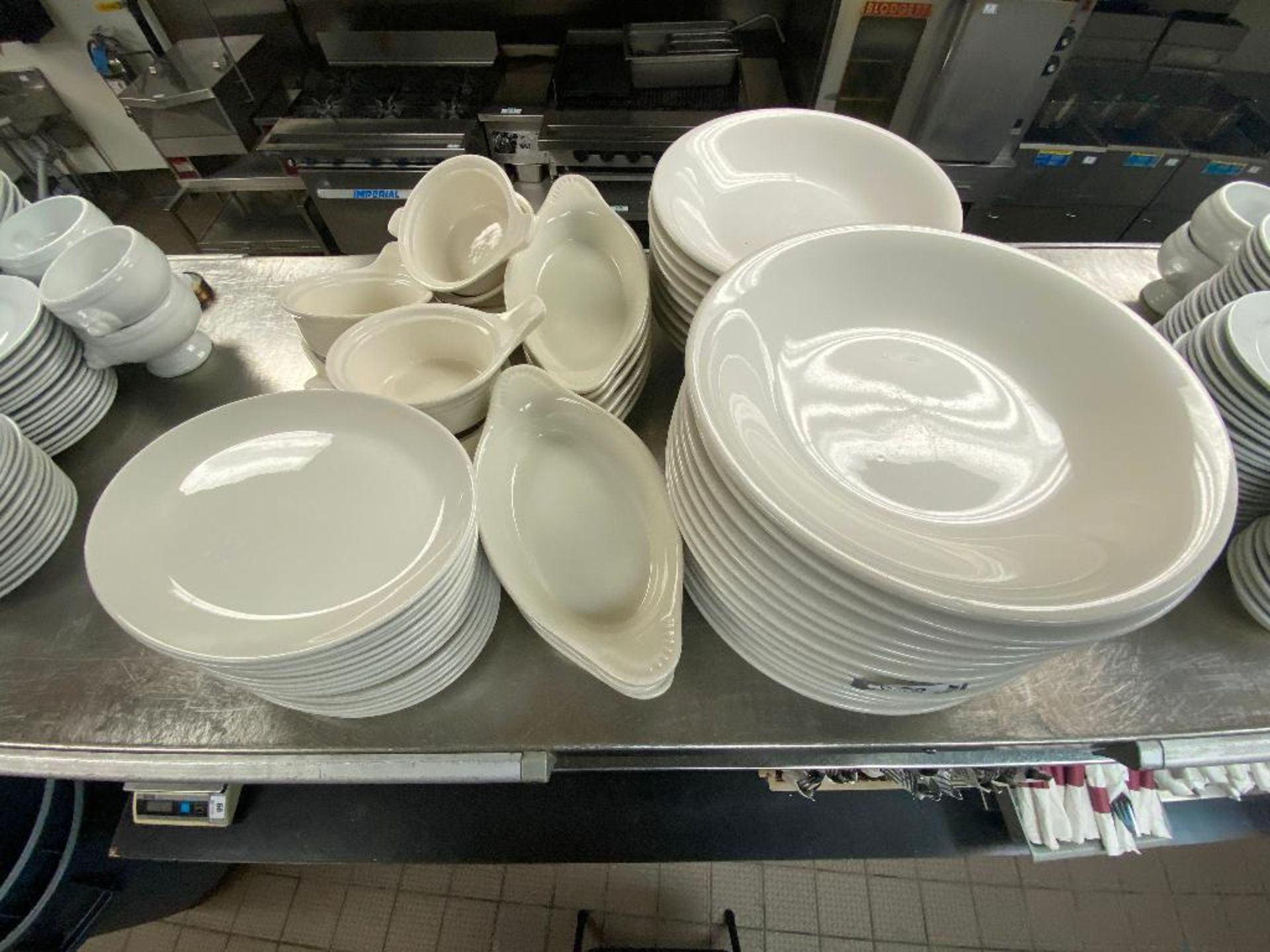 LOT OF ASSORTED DINNERWARE INCLUDING: PLATES, BOWLS, SOUP BOWLS & LASAGNA BOWLS