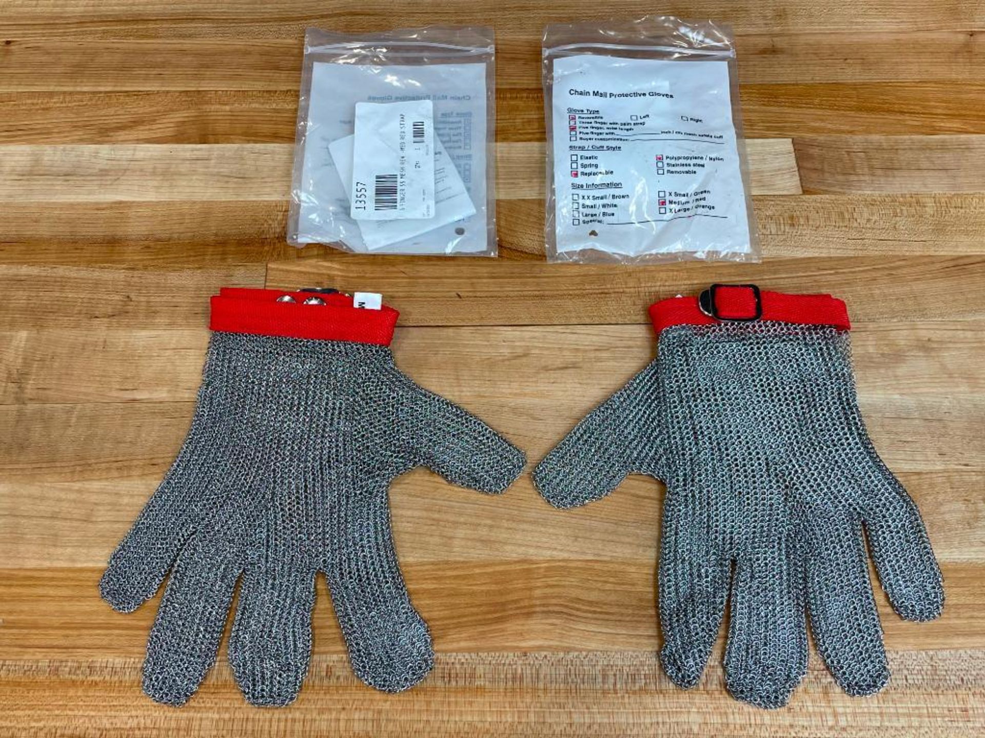 MEDIUM CHAIN MESH GLOVES W/RED STRAP, OMCAN 13557 - LOT OF 2 GLOVES