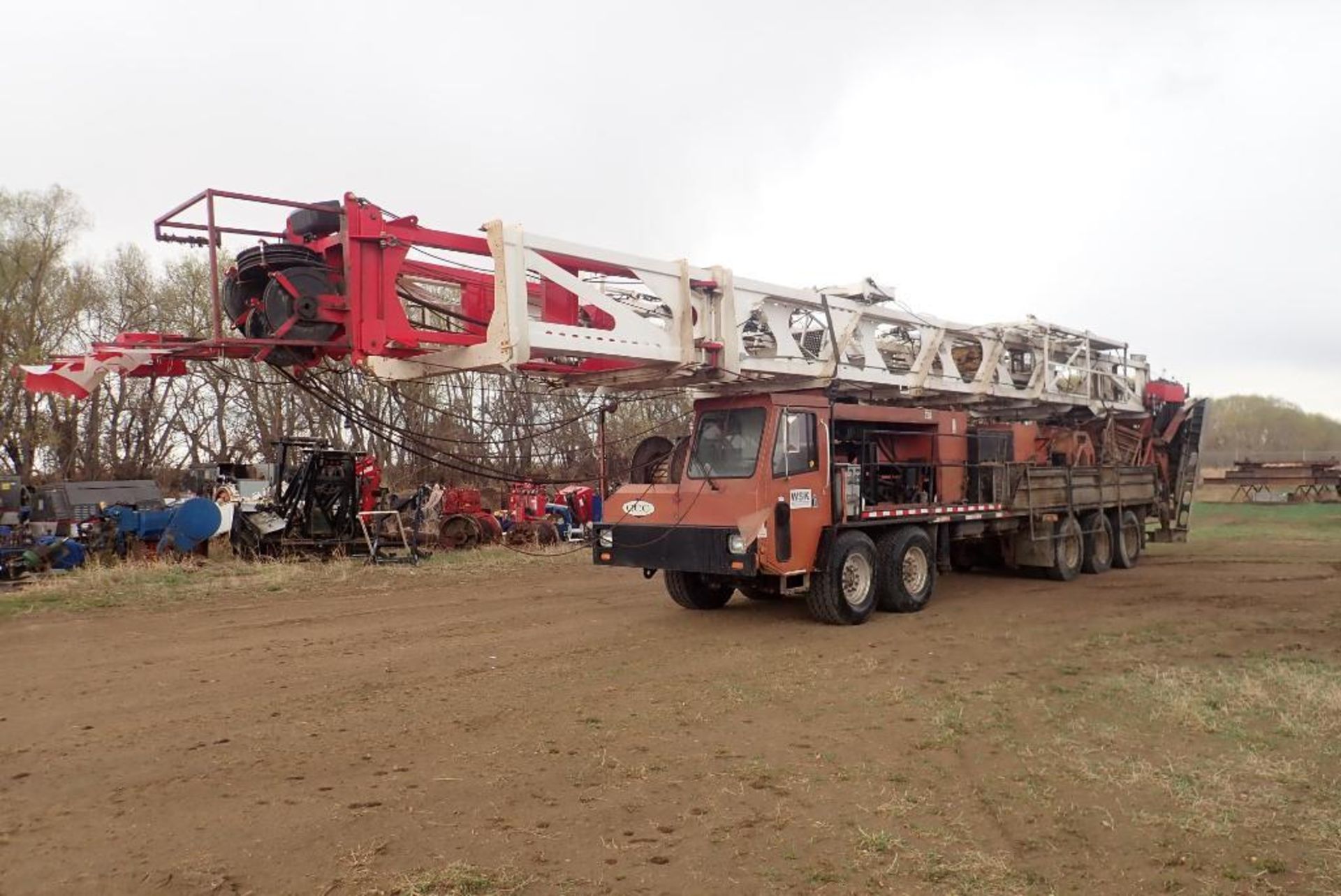 2006 Crane Carrier Class III Free Standing Double Mast Mobile Service Rig, VIN 1CYEHR688AT049767.