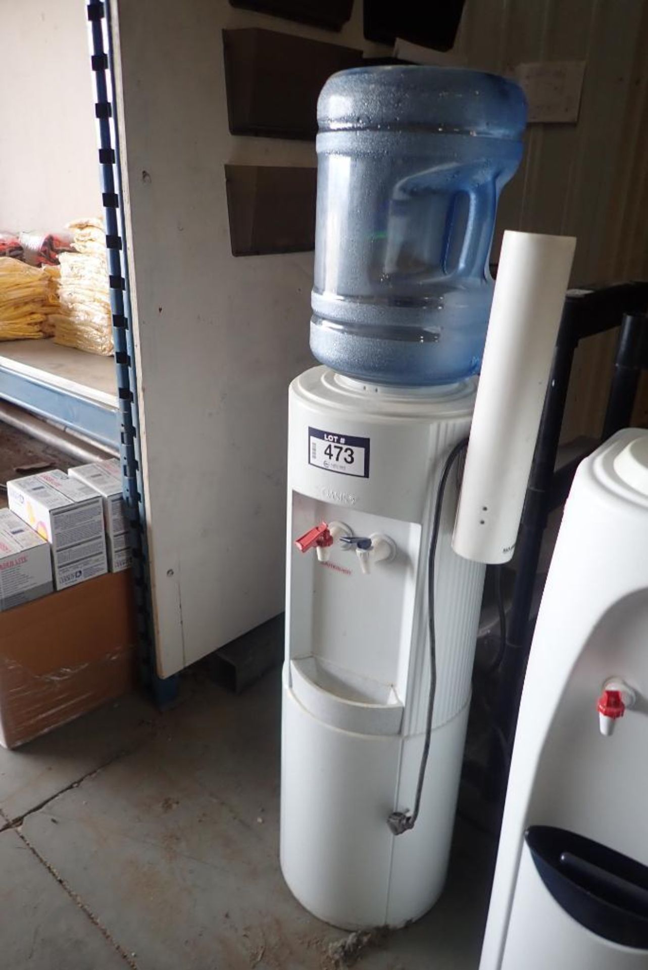 Lot of Oasis Hot/Cold Water Dispenser and Bottle Storage Stand.