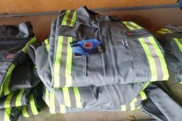 Lot of 6 Pair NFPA 2112 Certified Size 56T Coveralls-NEW, UNUSED.