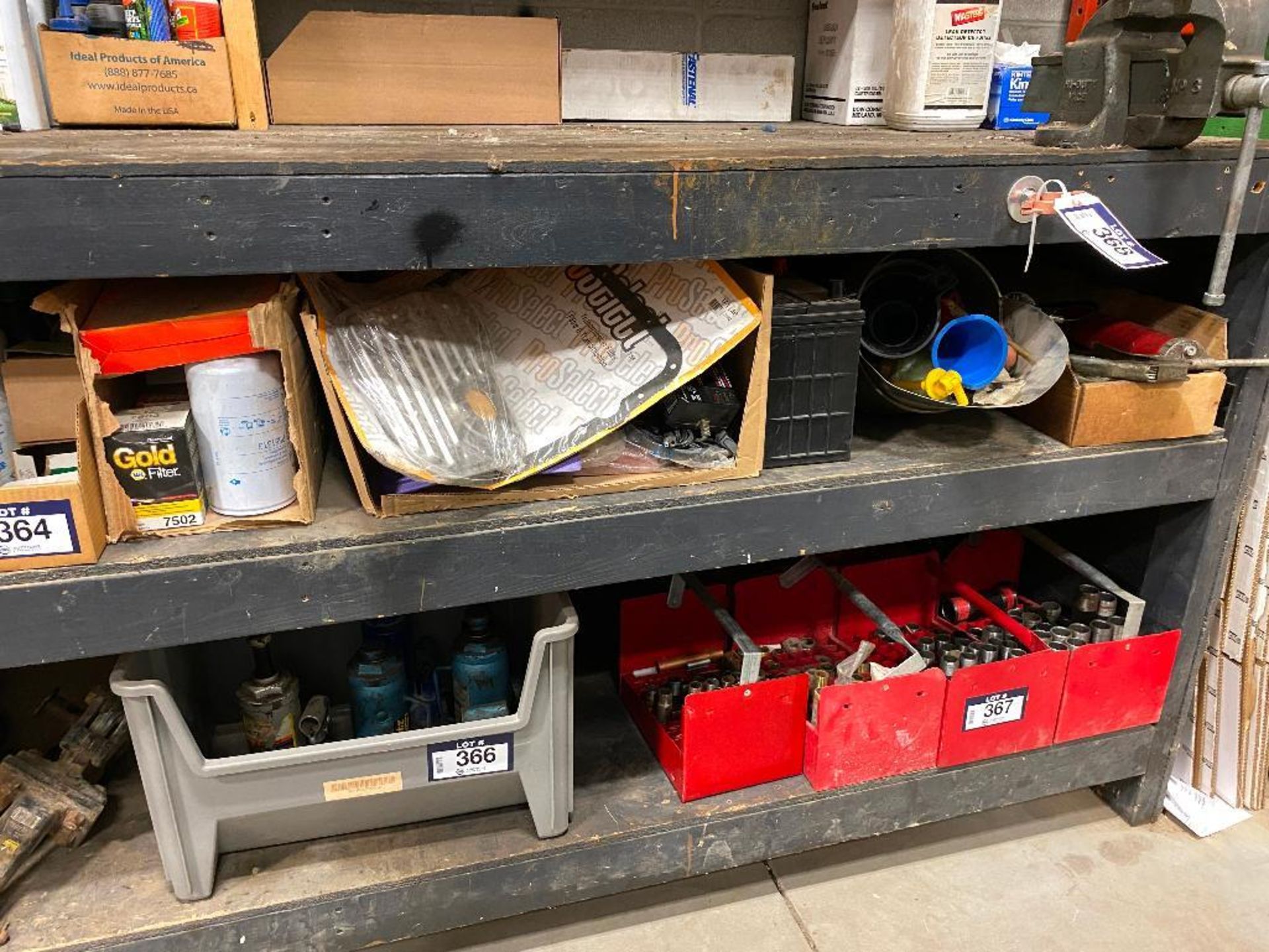 Lot of Asst. Automotive Parts including Oil, Filters, Battery, Funnels, Grease Guns, etc. - Image 2 of 2