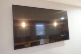 Samsung 65" Flatscreen Television w/ Wall Mount- REMOTE AT OFFICE.