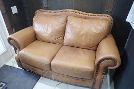 Leather Loveseat.